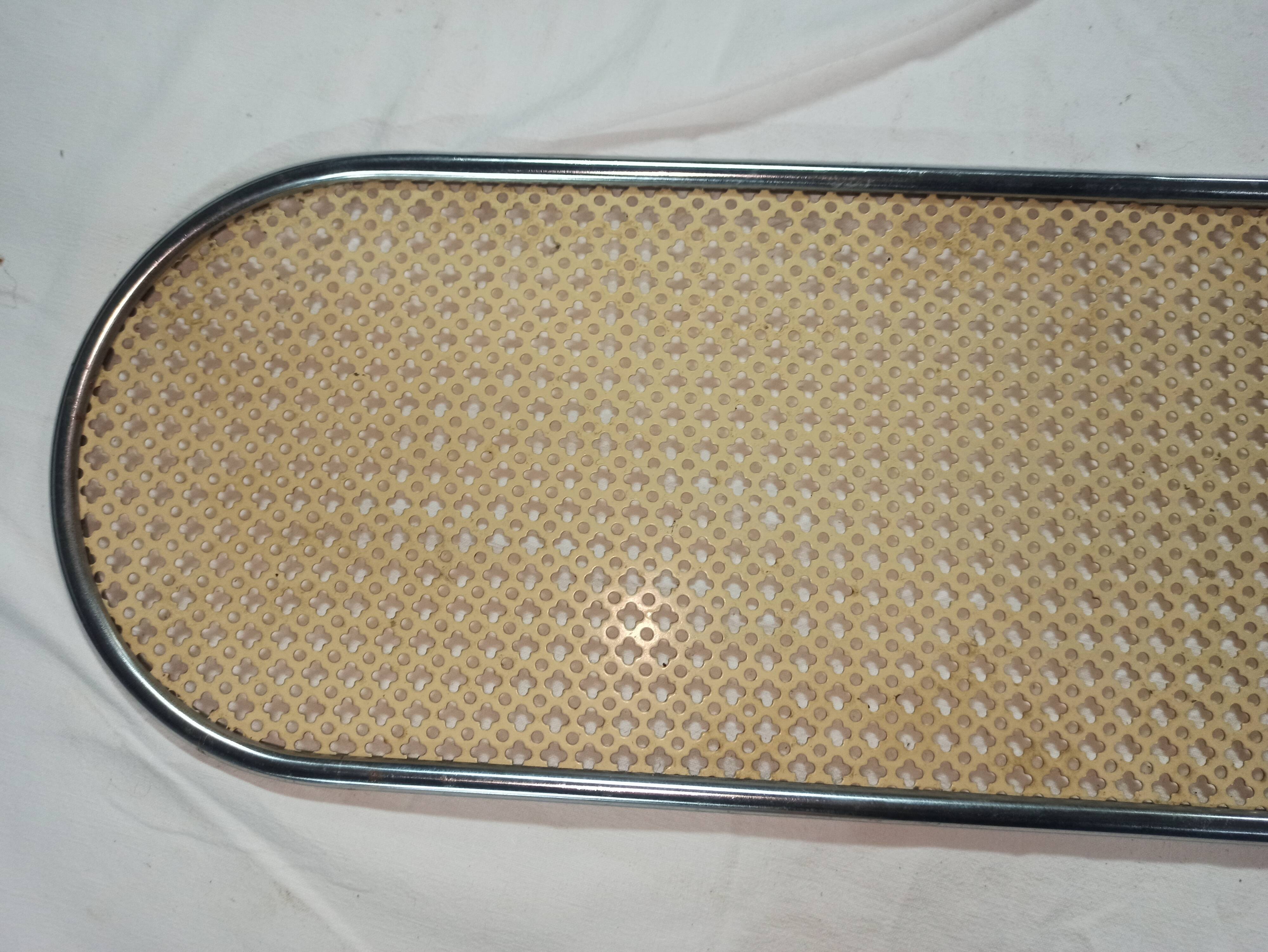 Yellow perforated iron plate top