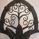 Pair of wrought iron candelabras. Mid-twentieth century.