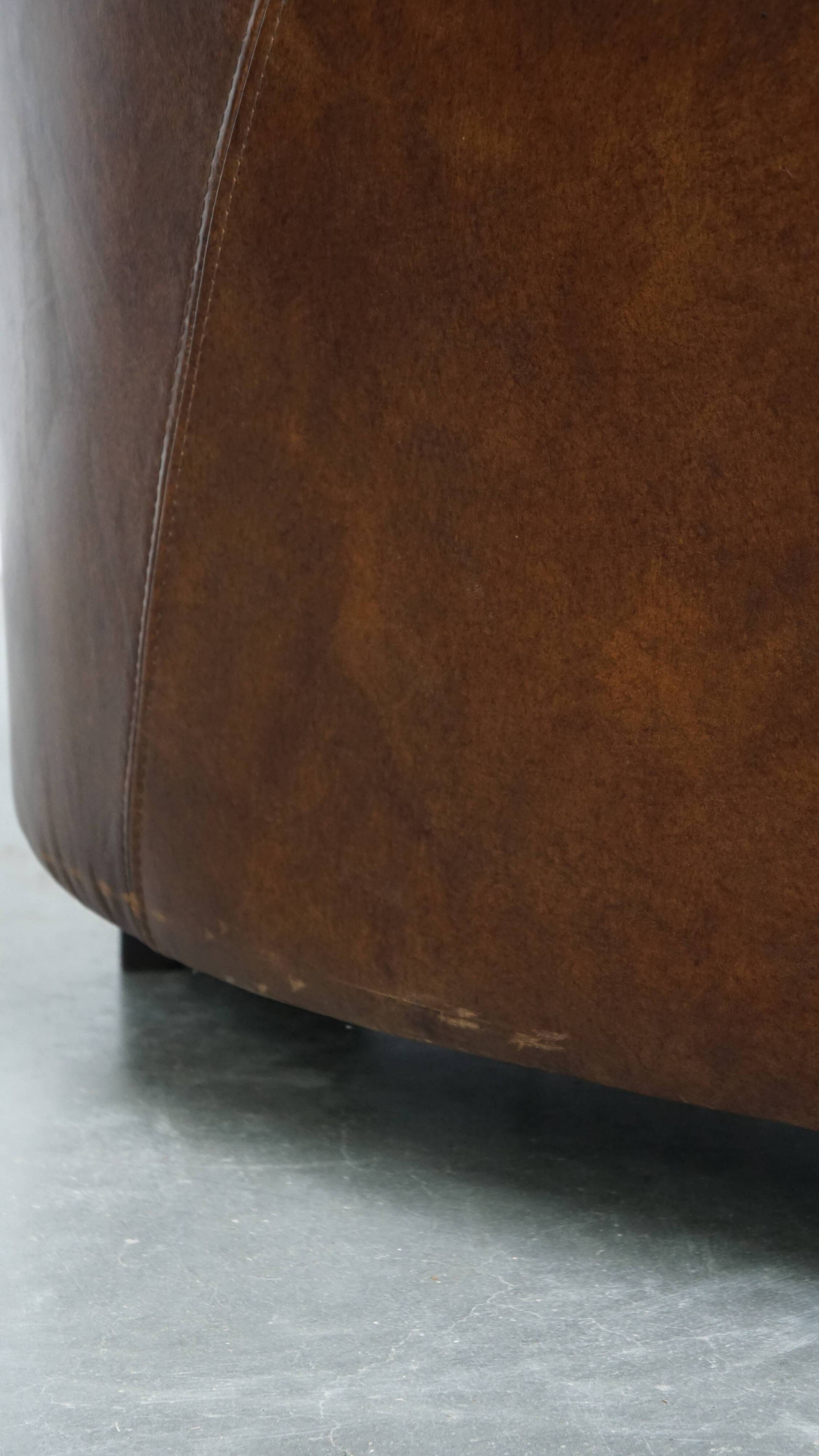 Brown Aviator design armchair made of cowhide leather