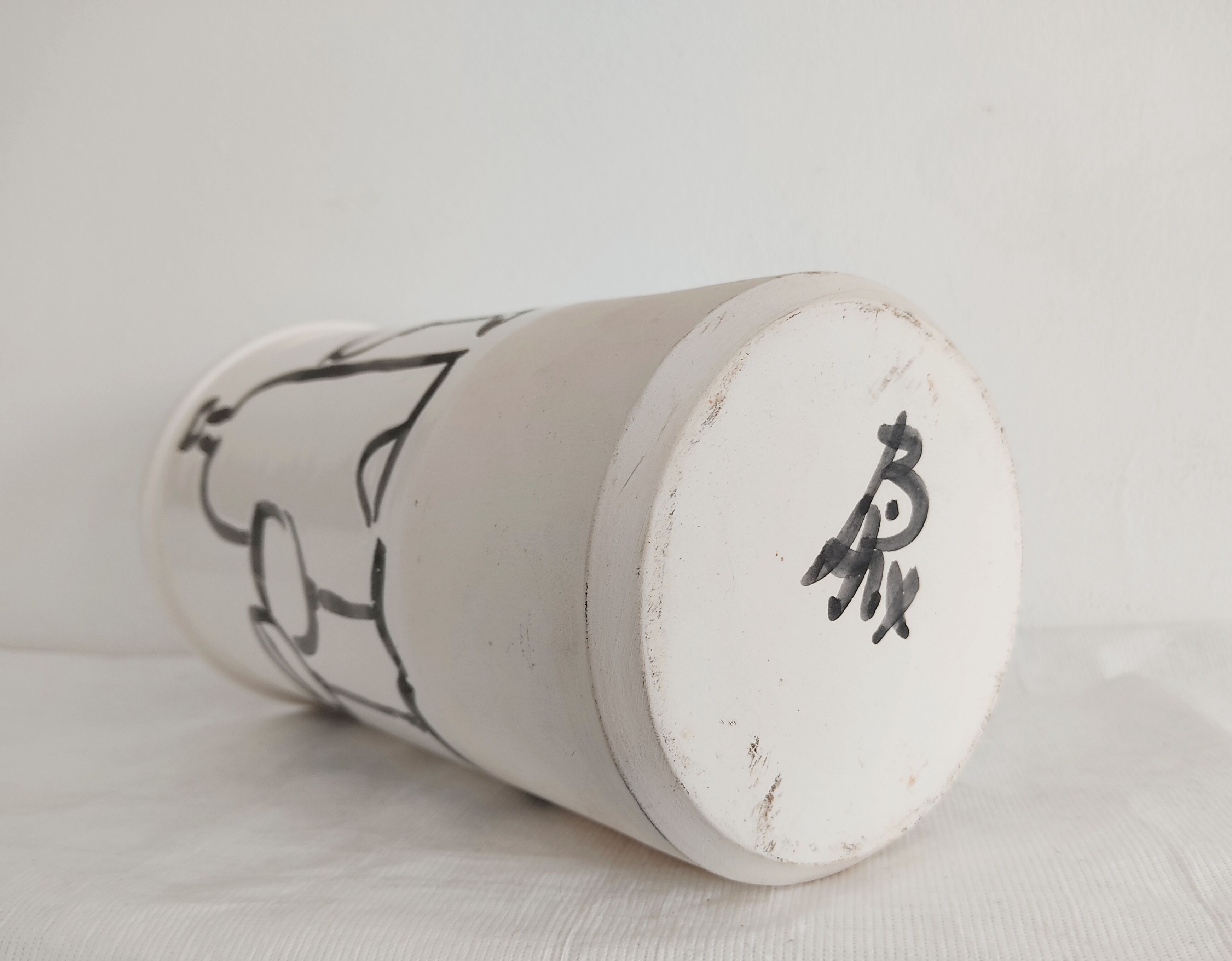 Vase decorated in hollows of bottles and glasses