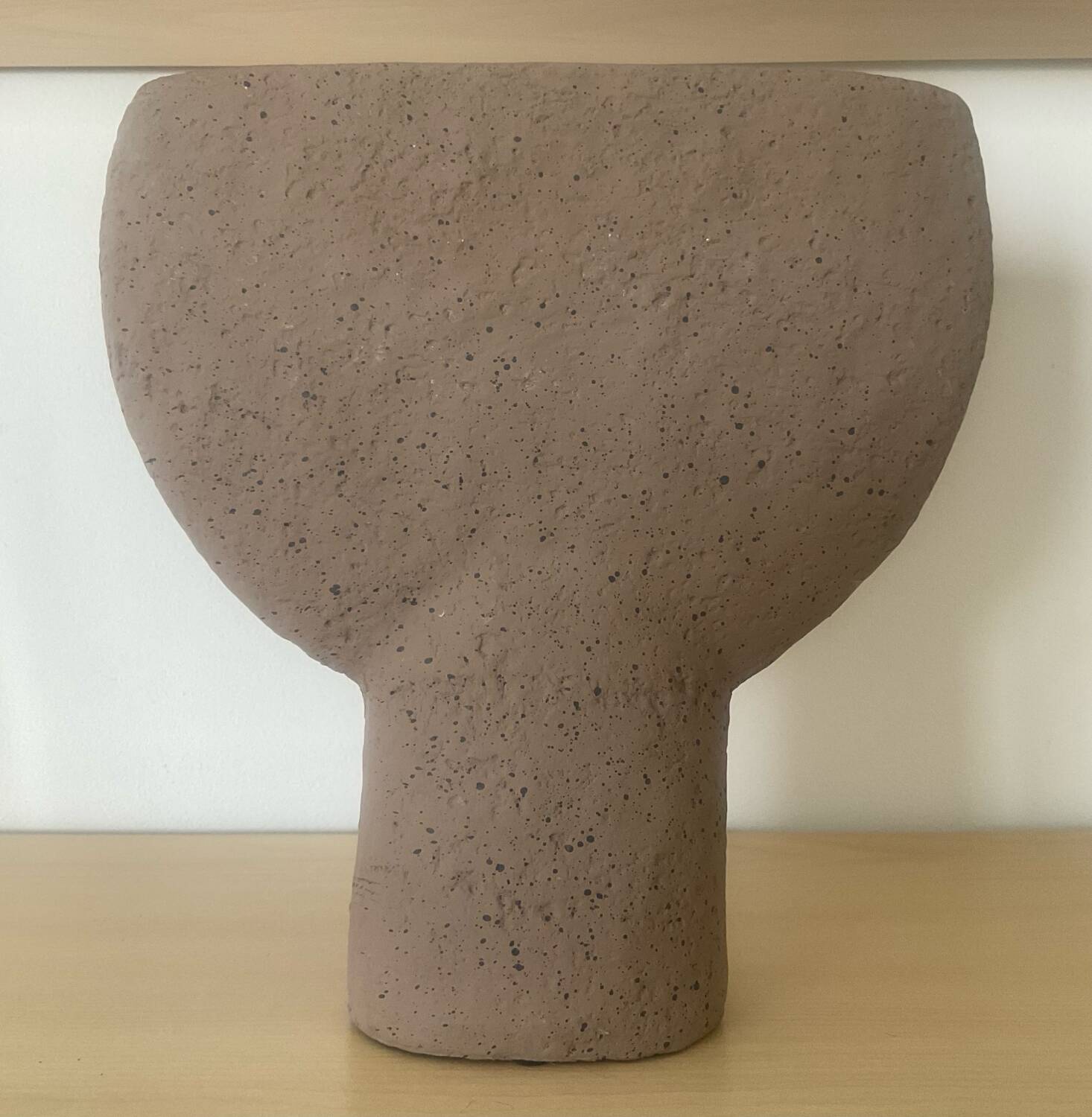 Vintage vase made of raw clay