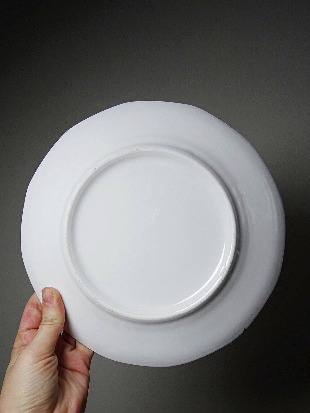 7 assiettes à dessert Bernardaud en porcelaine de Limoges décor floral, années 20-50