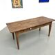 Solid pine farmhouse table, two drawers, fluted legs, France.