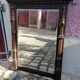 Rustic and Gothic beveled mirror