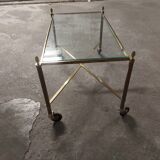Rolling coffee table in vintage gilded bronze