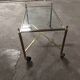 Rolling coffee table in vintage gilded bronze