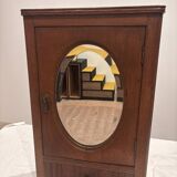 Wall cabinet with oval wall and drawer