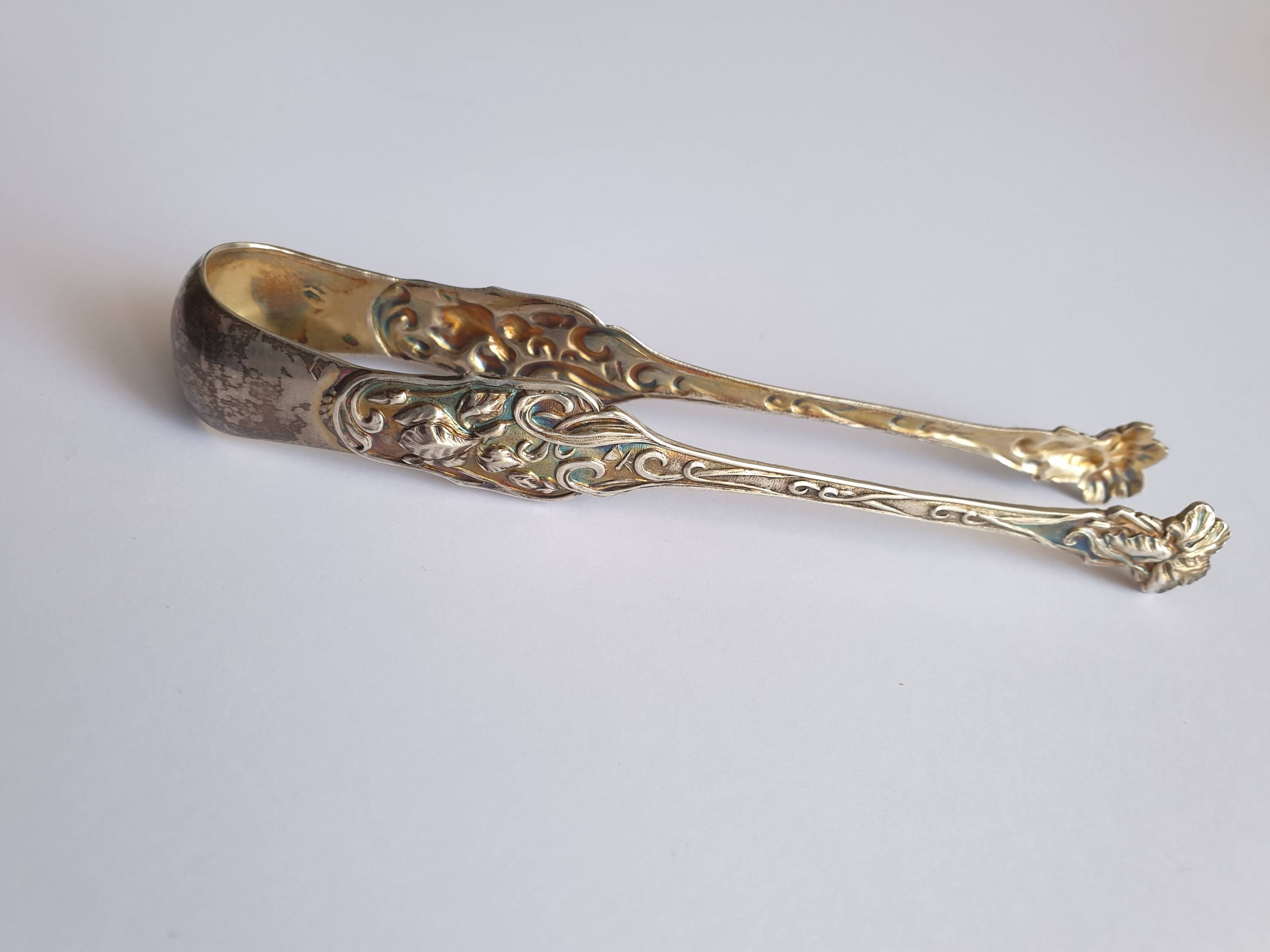Art Nouveau sugar tongs in solid silver and vermeil