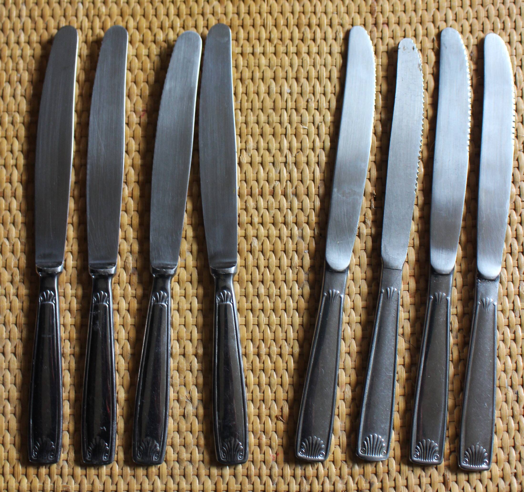 Mismatched set of 8 forks + 8 vintage shell stainless steel knives