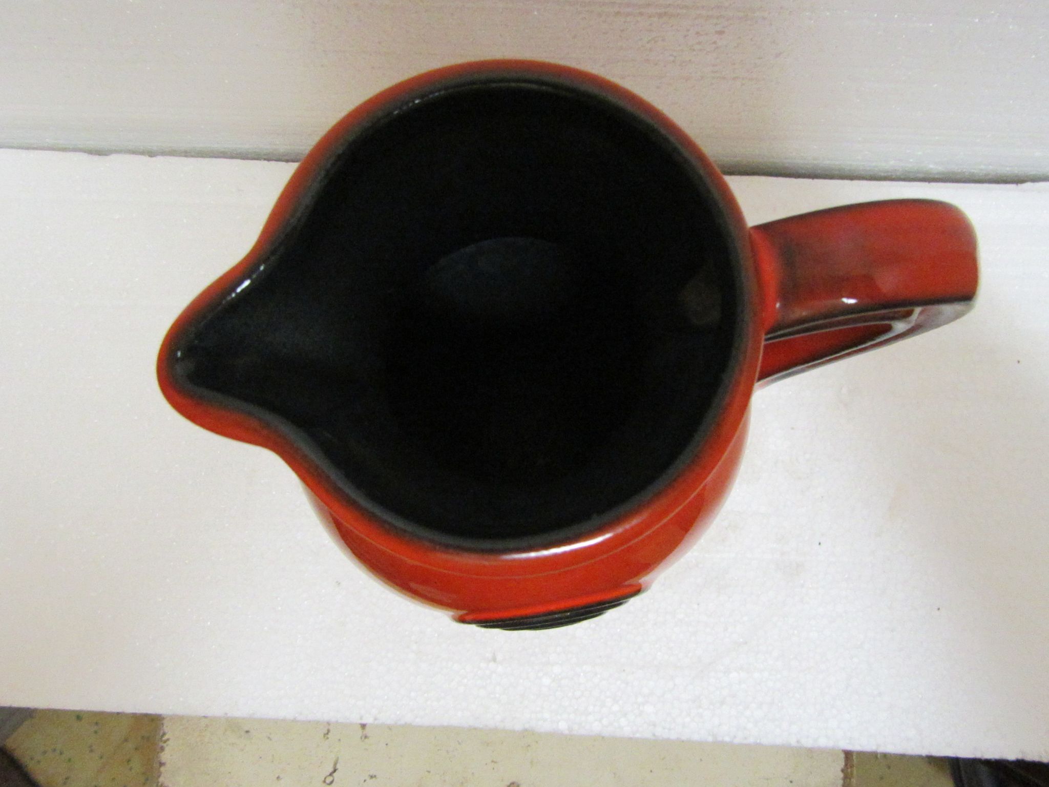 Orange and black pitcher Verceram