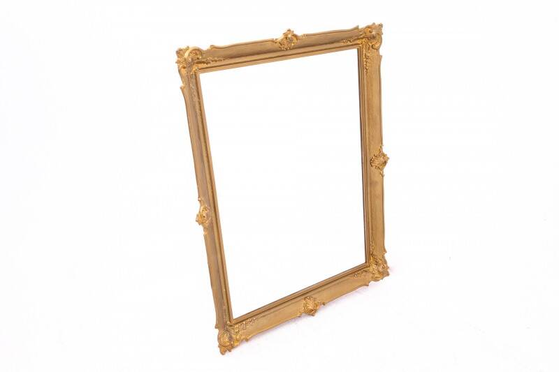 Large French mirror in a gold frame.
