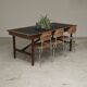 Vintage workshop folding table in oak with a hand-patinated black top.