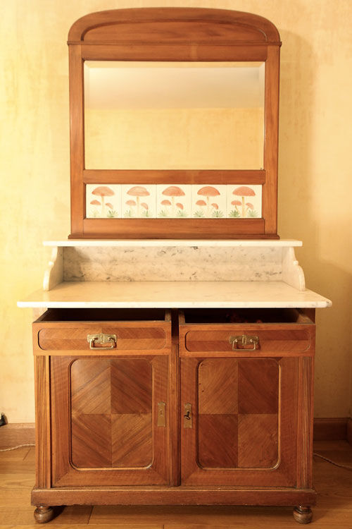 Vintage vanity toilet furniture with marble top.