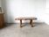 Brutalist coffee table in solid walnut, live edge slab top, France.