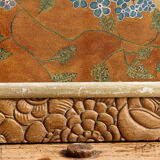 Bouquet of flowers in carved art deco frame