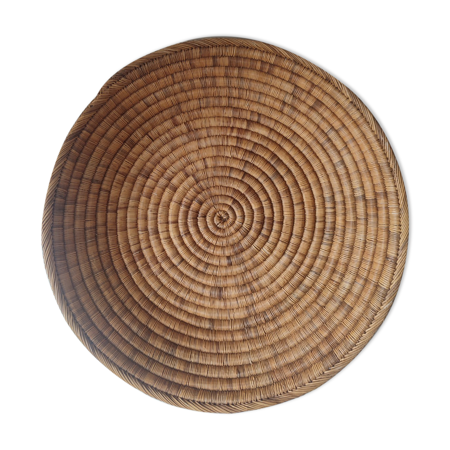 Ethnic plateau in woven palm leaf