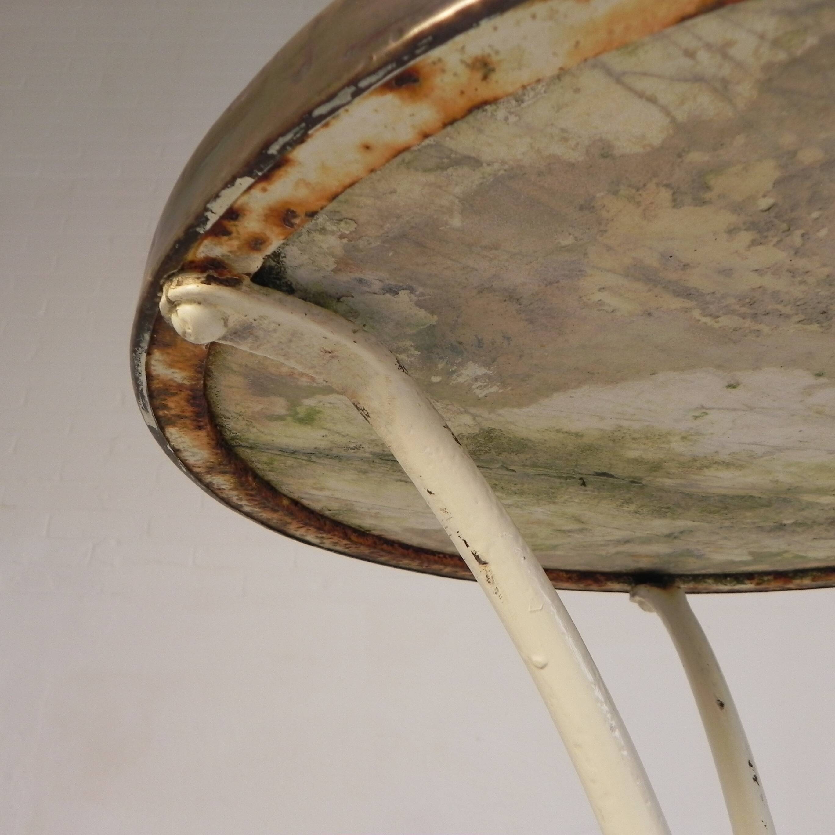 Bistro table with a marble top and brass edging, early 20th century.