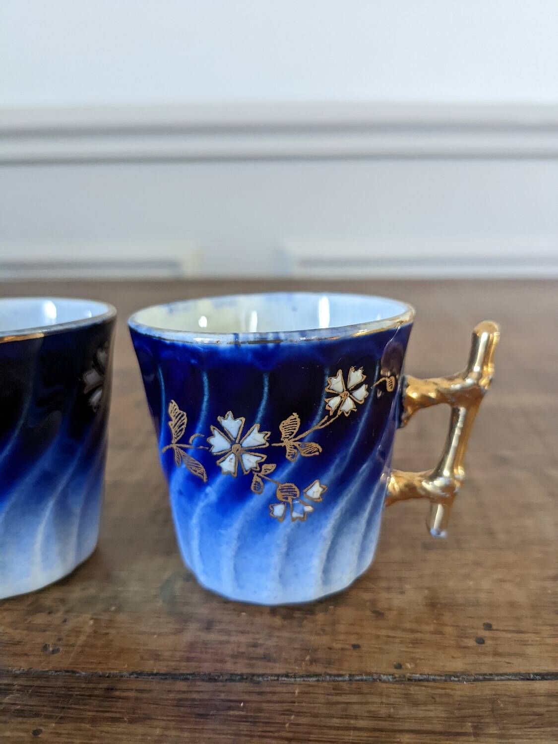 Two Luneville coffee cups
