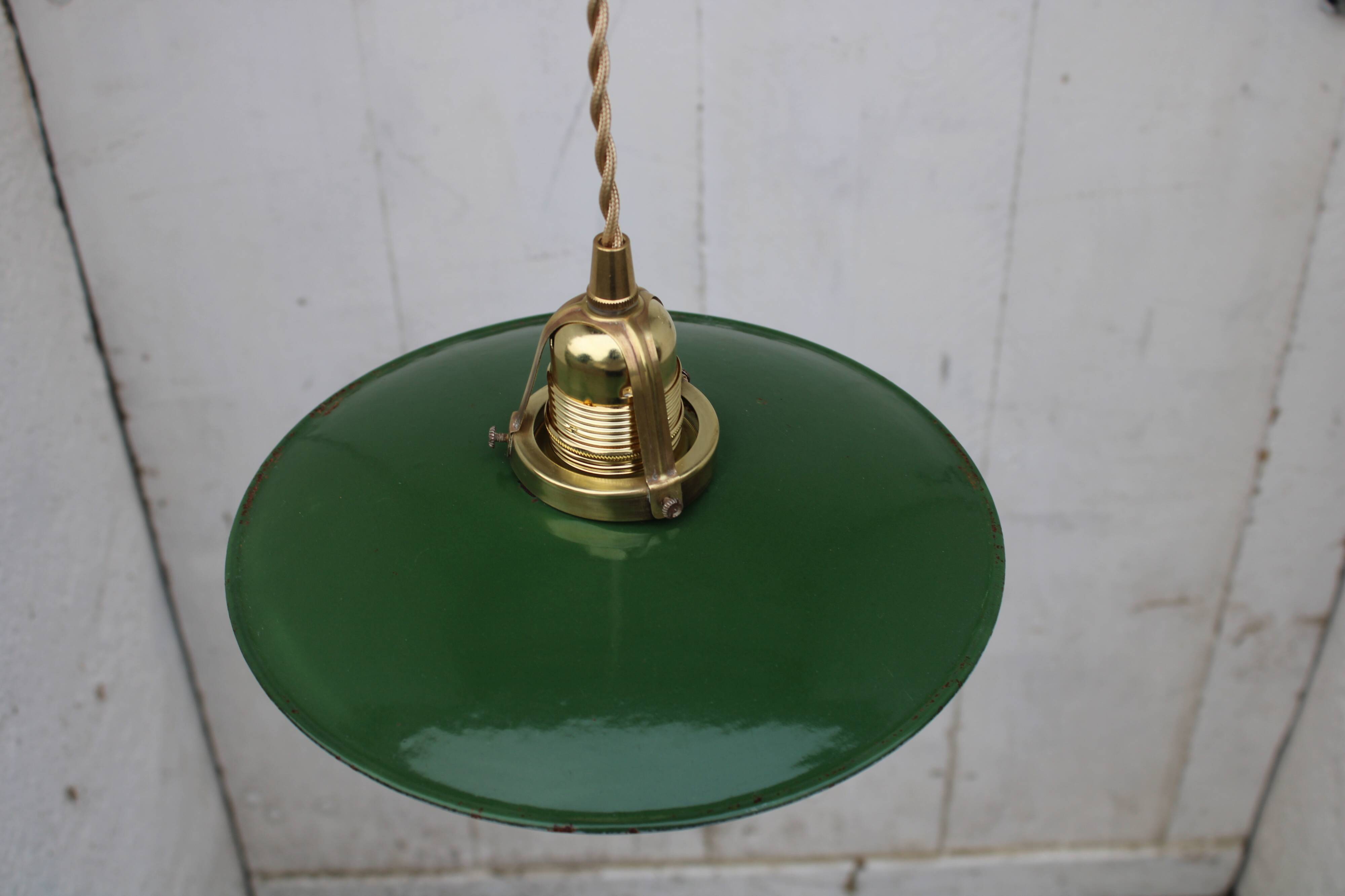 Hanging in green enamelled sheet metal