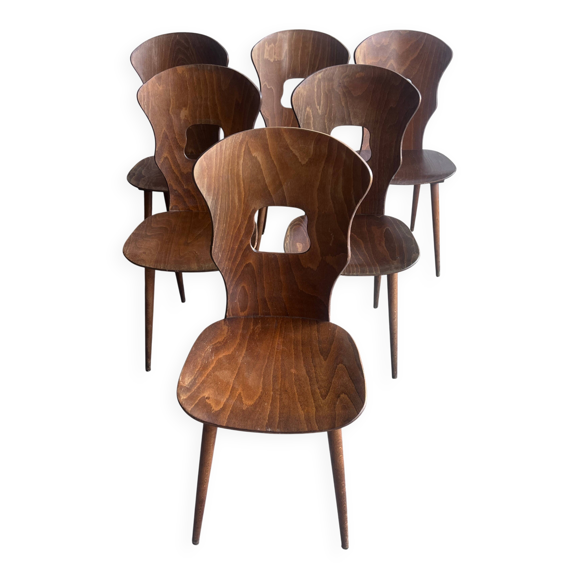 Set of six plywood dining chairs by Baumann, France, 1950s.