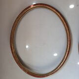 Pair of oval gilded frames Louis XVI style