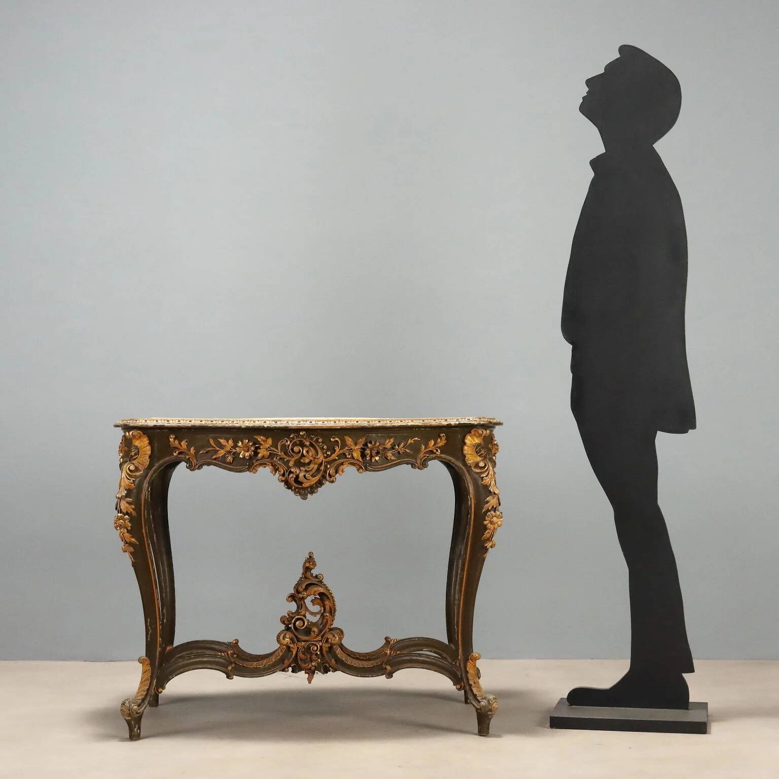 Baroque-style table in carved wood