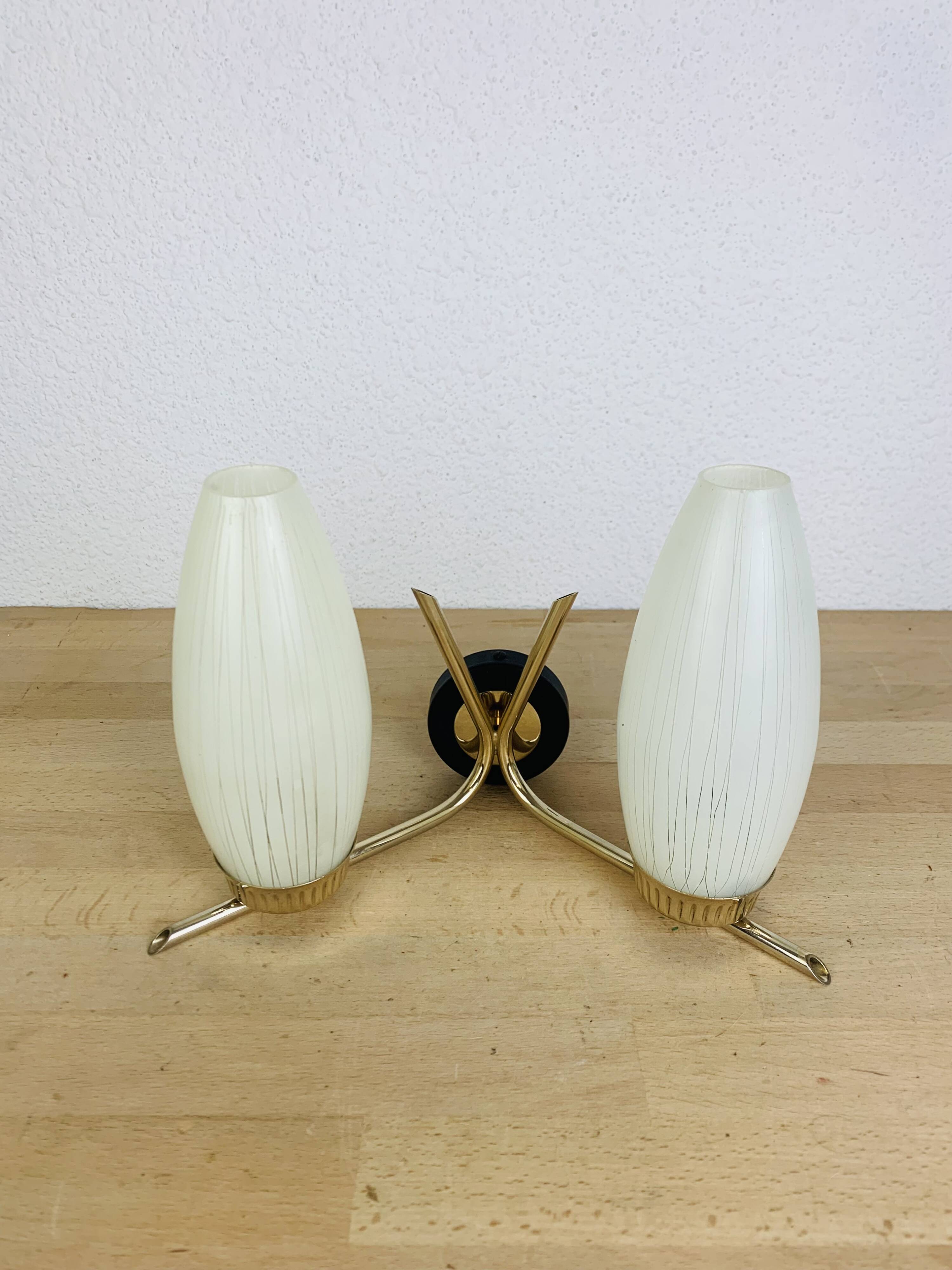 50s double-light wall light, brass and black metal, opaline tulips