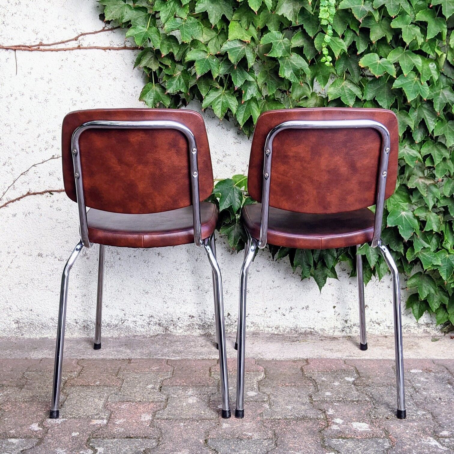 70s metal and imitation leather chairs
