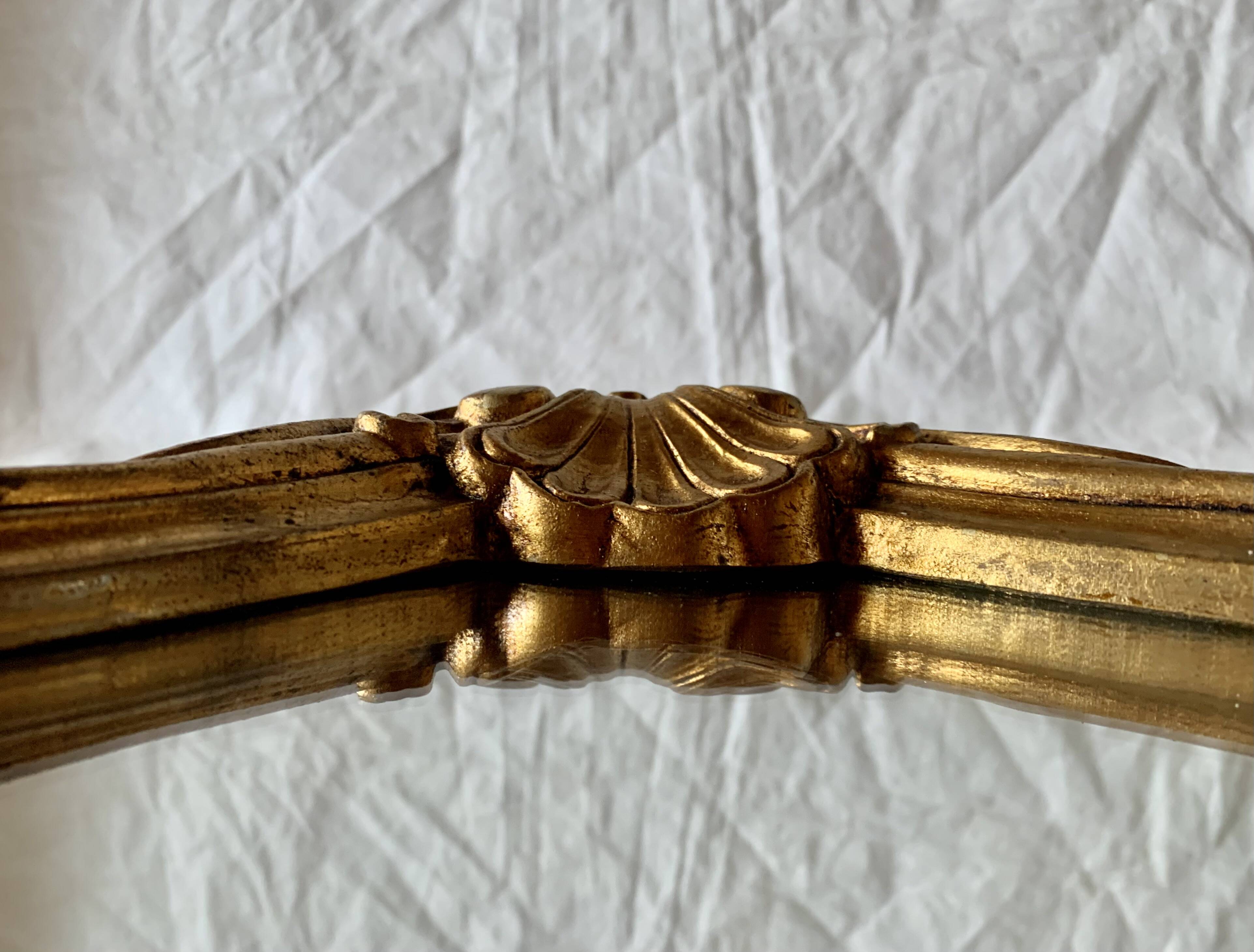 Large rococo mirror in gilded wood