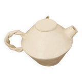 White stoneware teapot