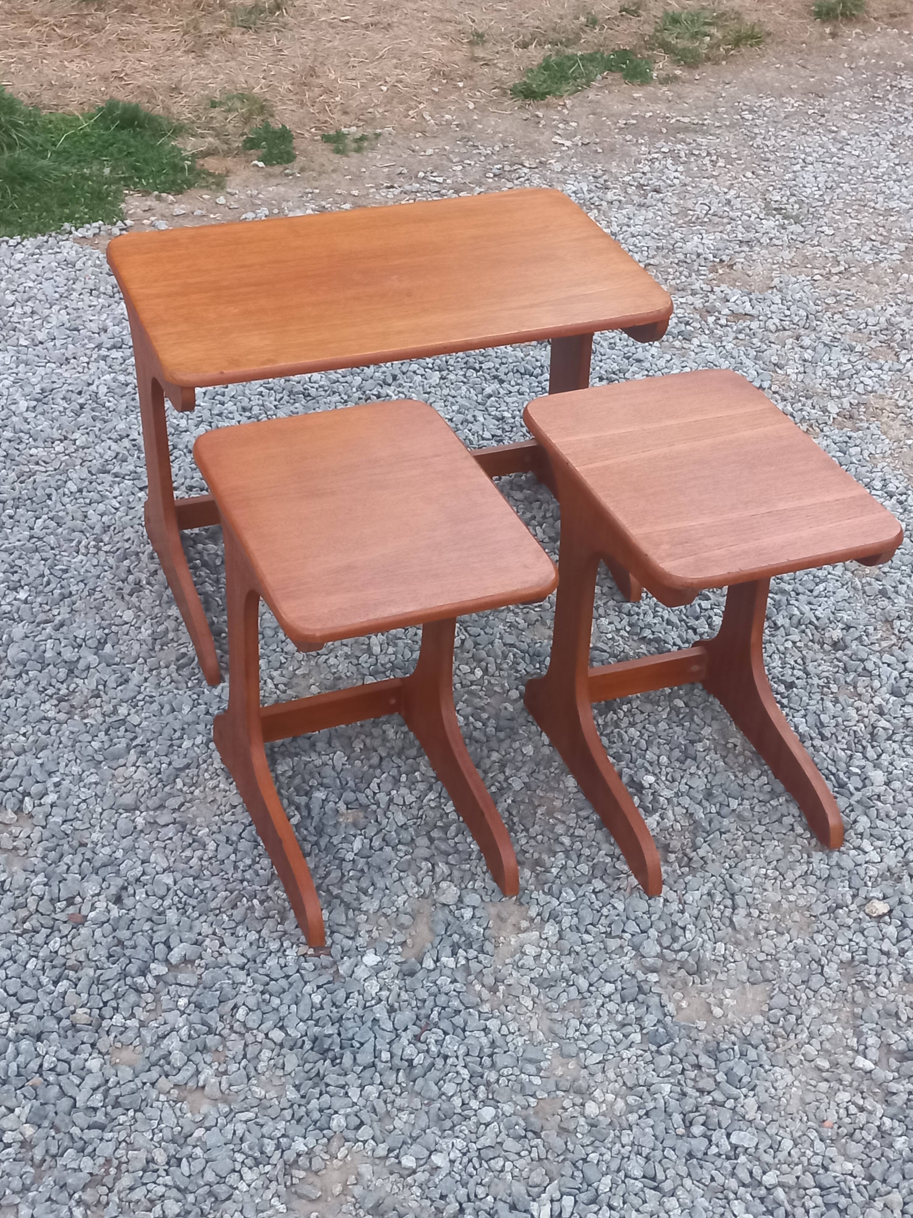 Set of 3 nesting tables in Scandinavian style made of teak from the 1970s.