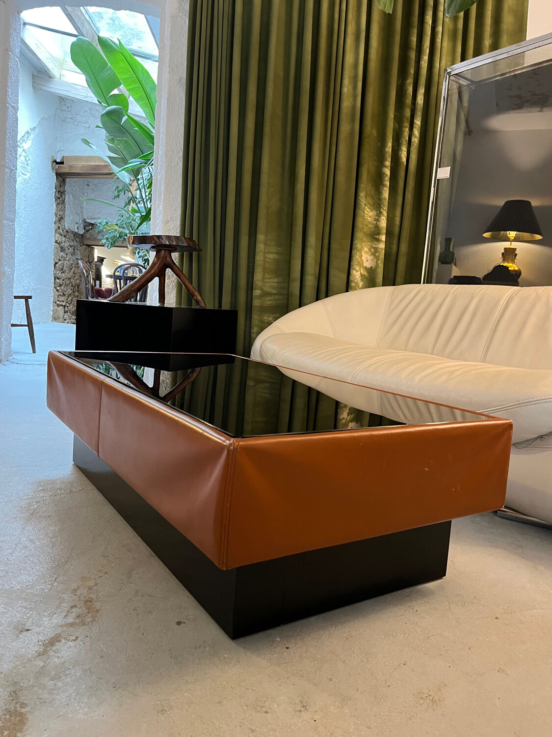 Caramel leather and black glass coffee table