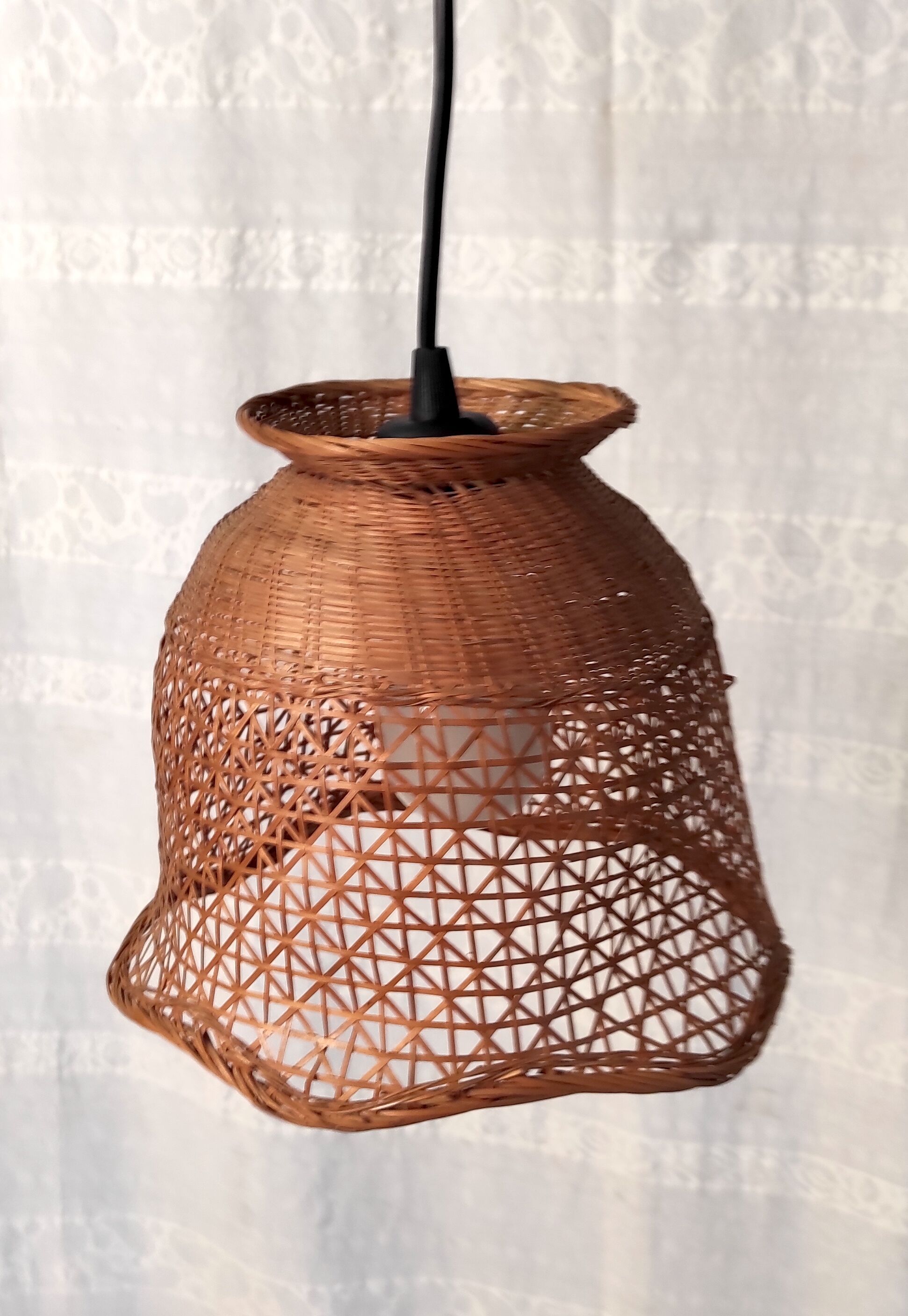 Braided wicker flower suspension