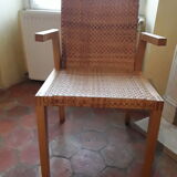 Two vintage braided straw armchairs