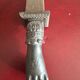 Cast iron door knocker from the 19th century or earlier.
