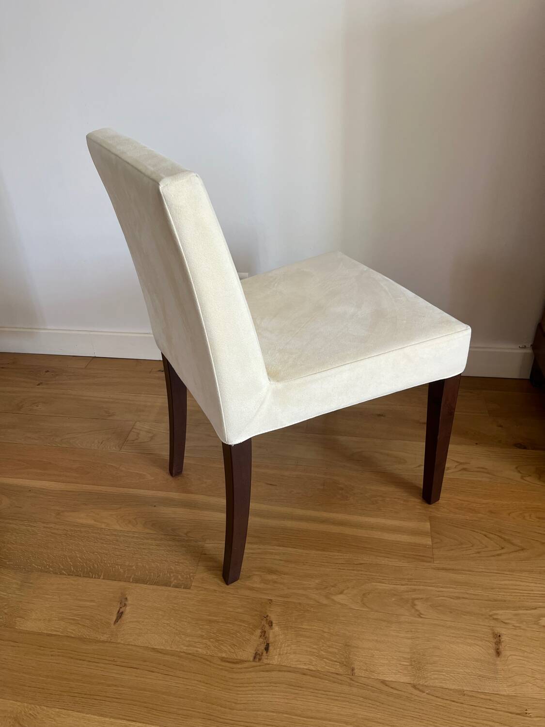 6 Ligne Roset chairs in ivory alcantara.