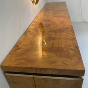 Sideboard in elm magnifying glass and brass. 1970