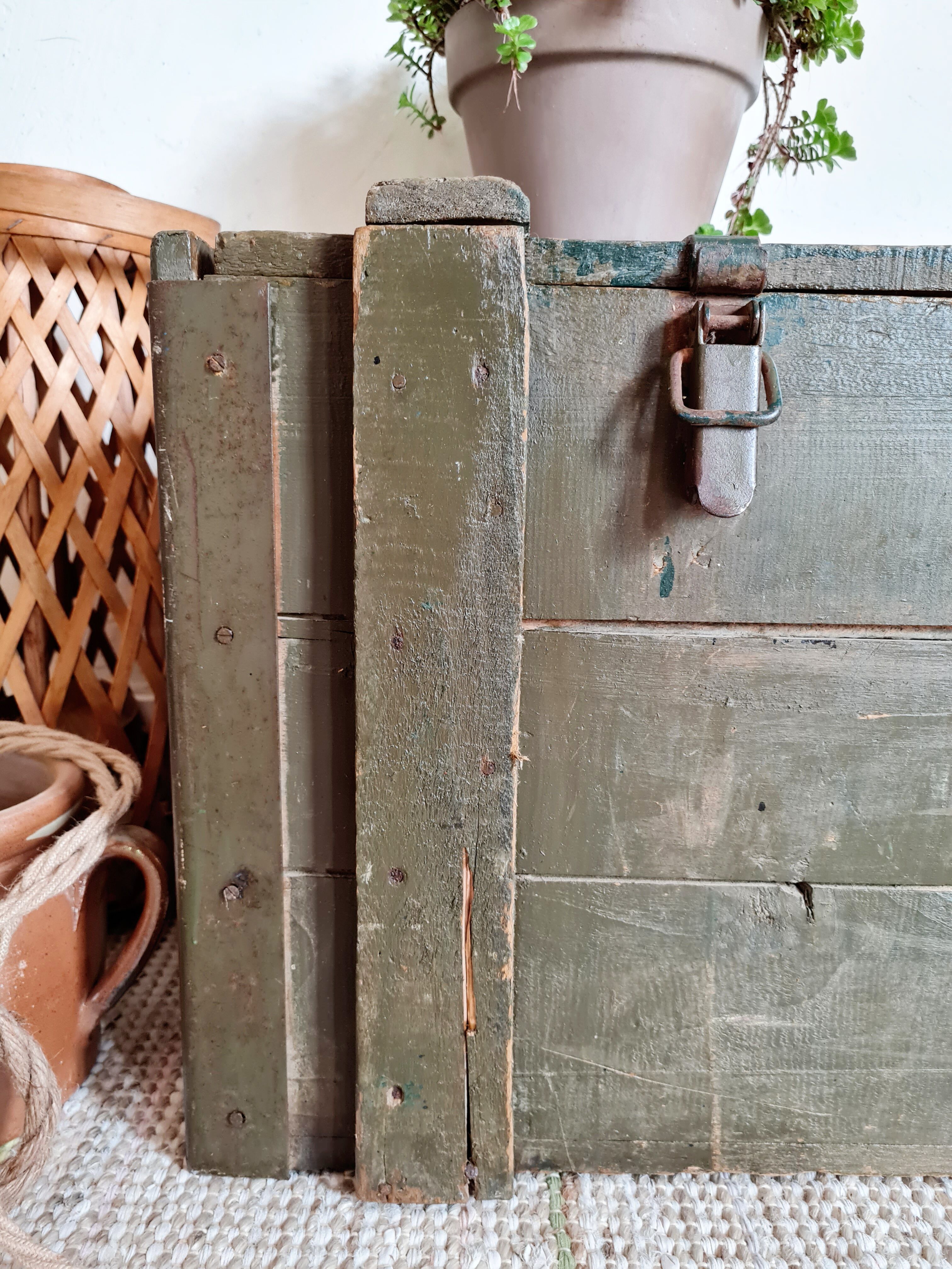 Old green military crate or trunk