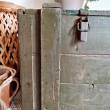 Old green military crate or trunk