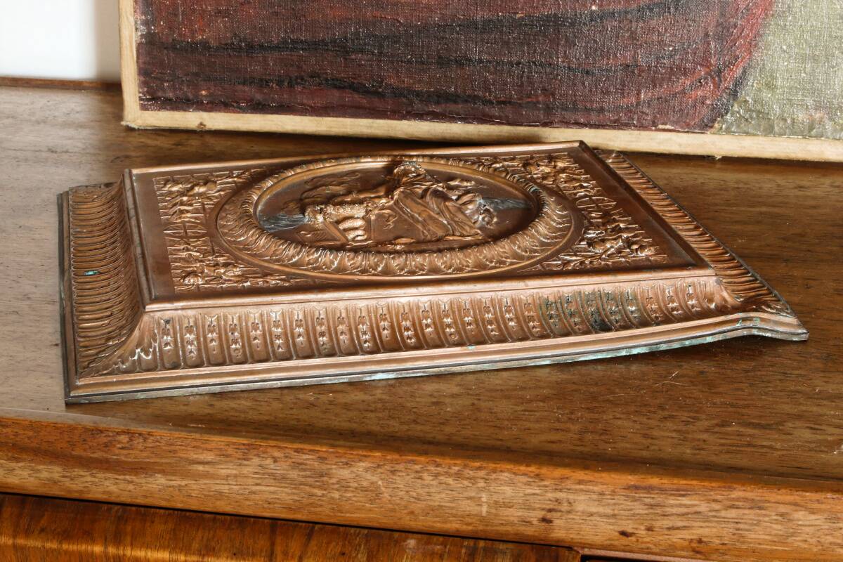 Repoussé copper plaque, early 19th century, in Neoclassical style.