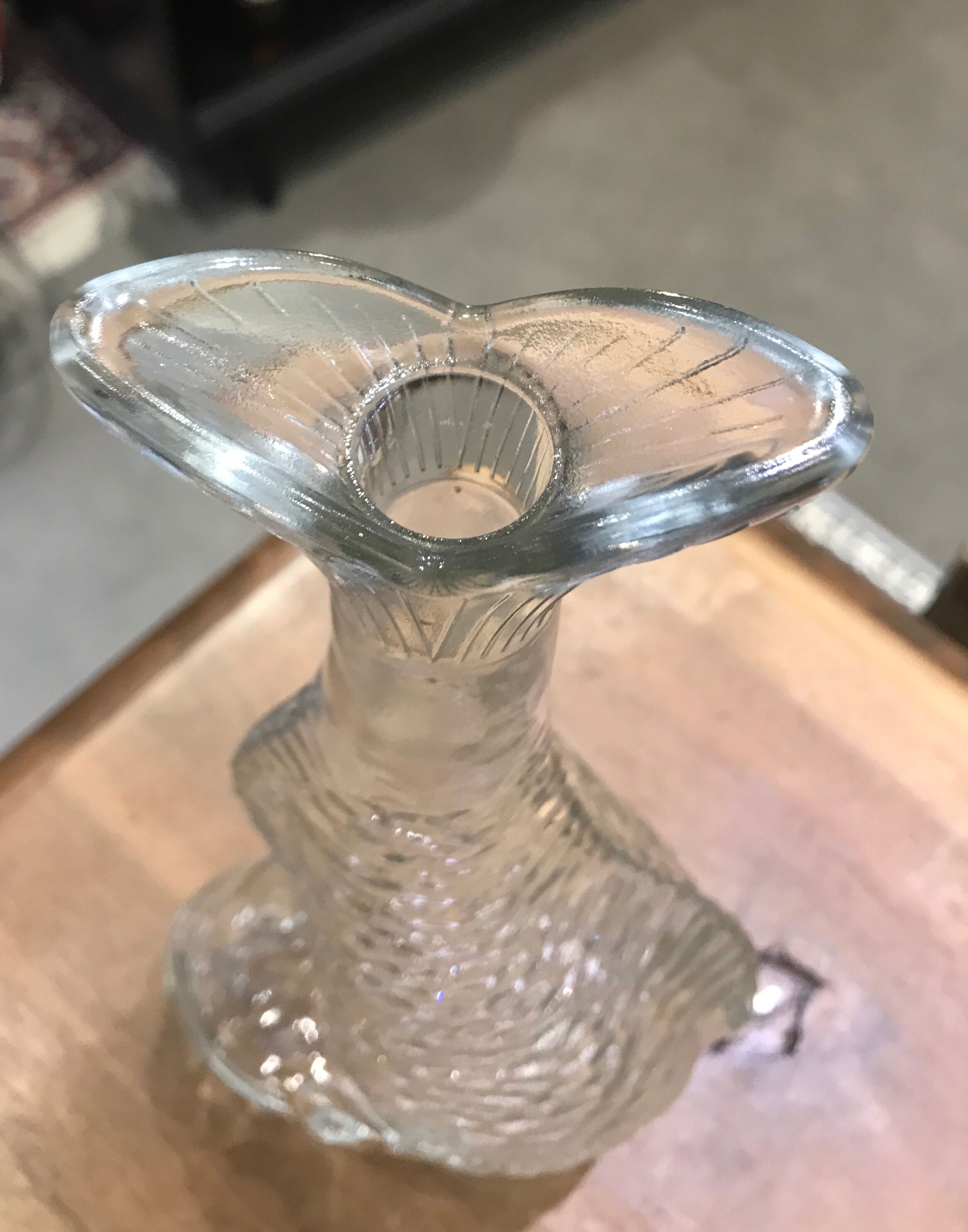 Transparent glass vase fish-shaped