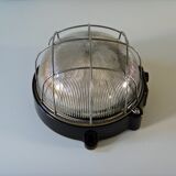 Ceiling lamp in Bakelite and glass.