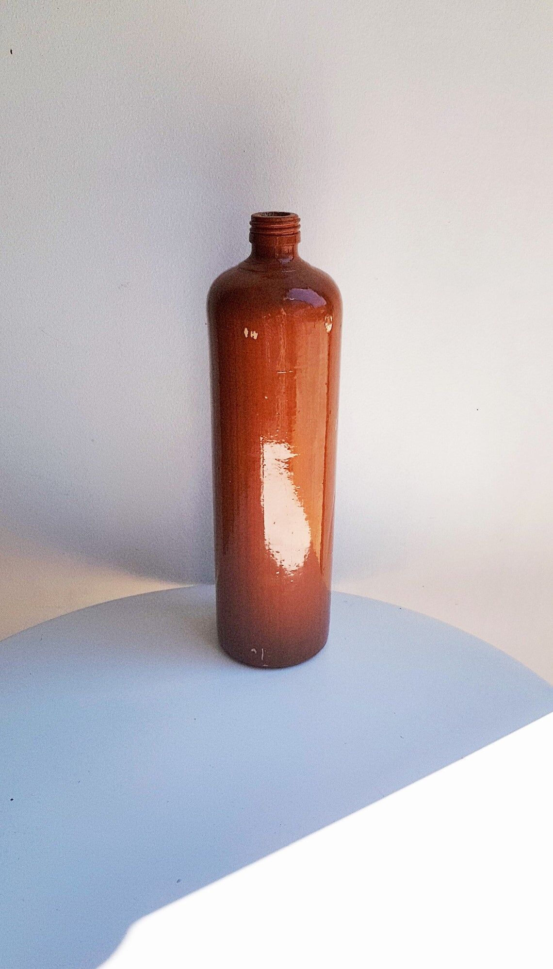 Enamelled sandstone bottle