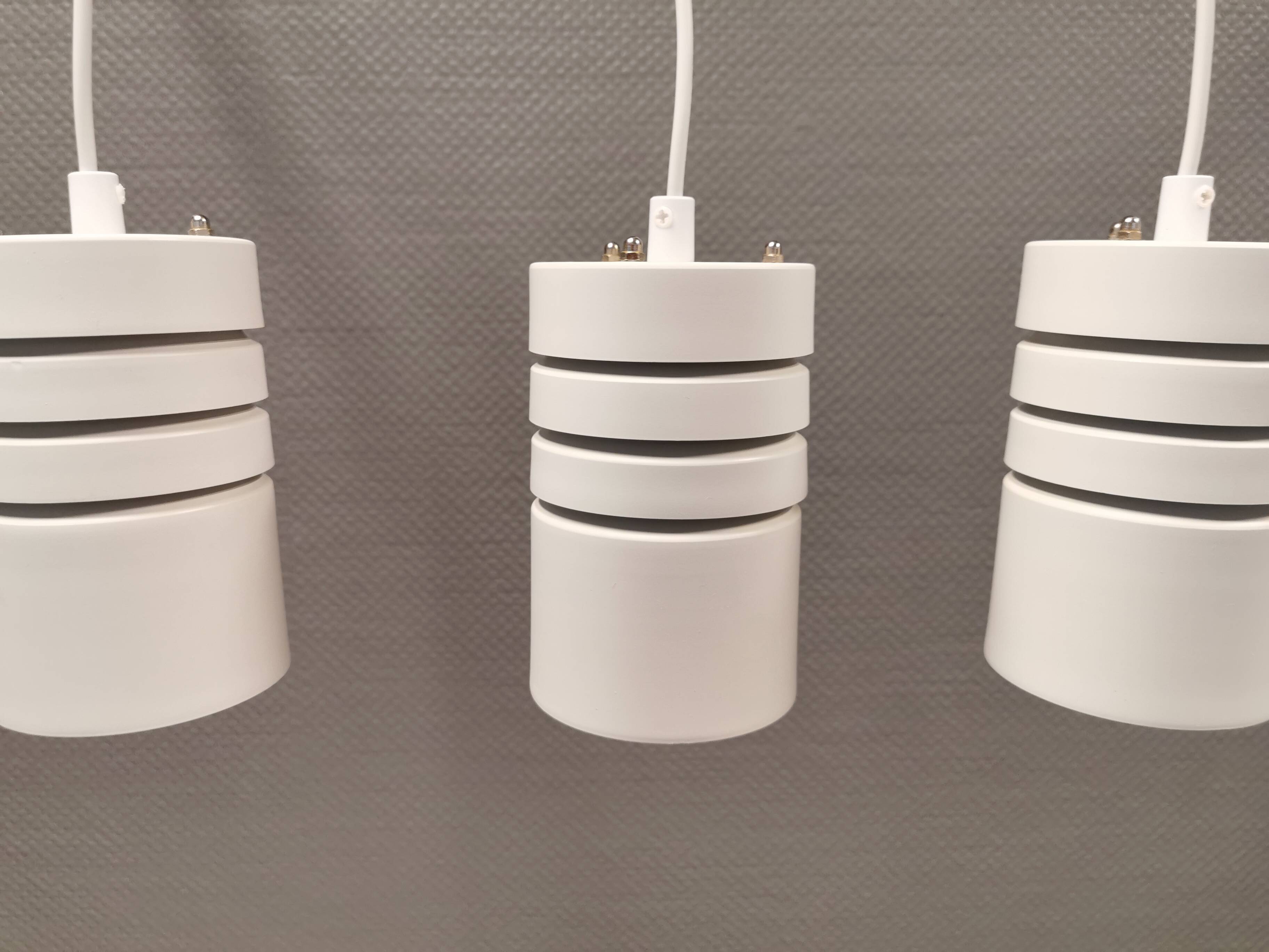 Cylinder-shaped hanging lamps from Danish Super-Light, 1980s.