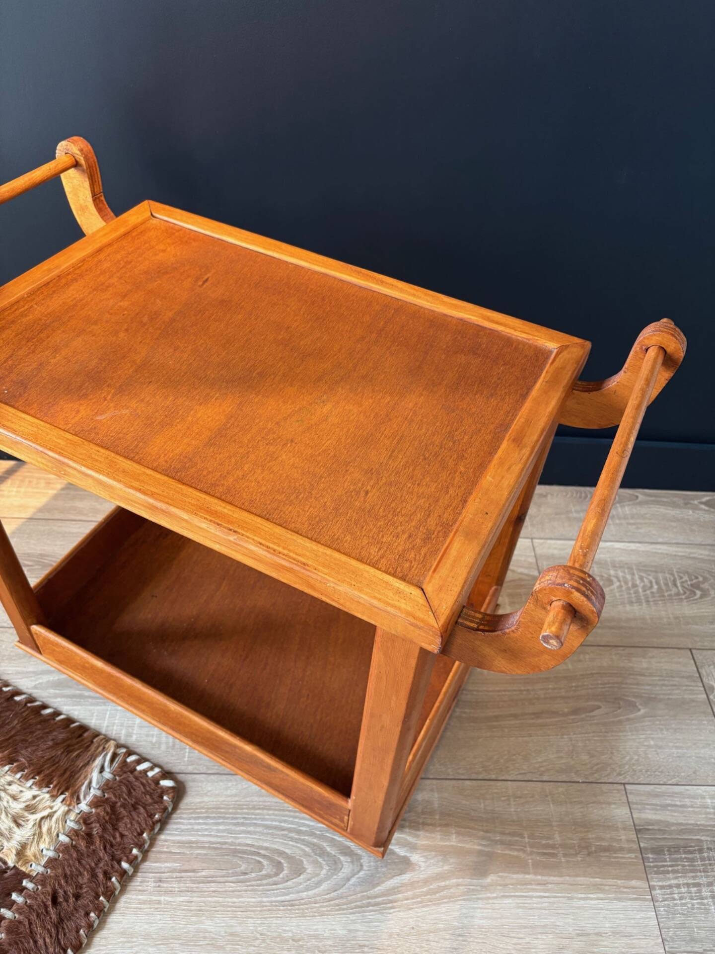 Vintage wooden trolley on wheels