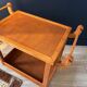 Vintage wooden trolley on wheels