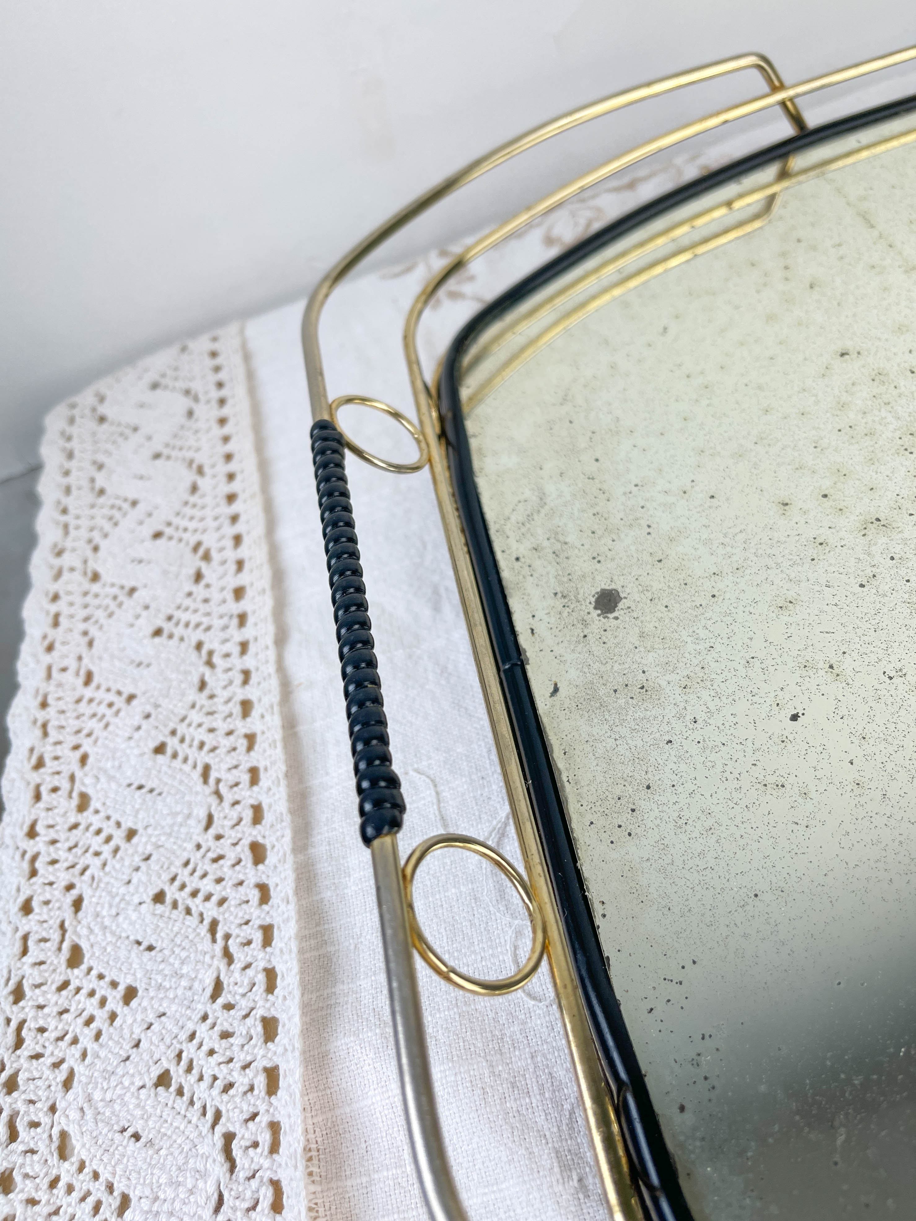 Art Deco style mirror and brass serving tray