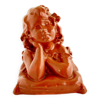 Bust of a pensive child in plaster