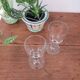 2 small stemmed glasses