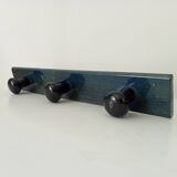 Vintage wall-mounted coat rack in lacquered wood from the 60s